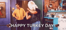 a man with a turkey on his head is dancing in a kitchen with two men .