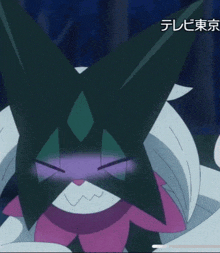 a close up of a cartoon character with japanese writing