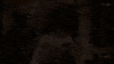 a woman making a heart shape with her hands and the words gray street on the bottom right