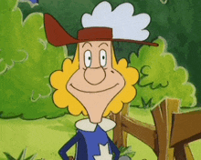 a cartoon character is wearing a hat and smiling in front of a wooden fence