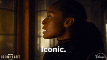 a woman says iconic in front of a disney + logo