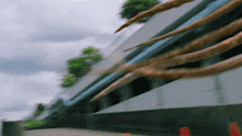 a blurred image of a building with a sign that says l on it