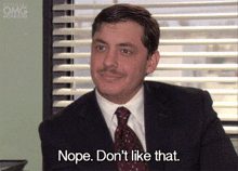 a man in a suit and tie says nope . don 't like that