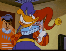 a cartoon duck wearing a purple and red jester hat