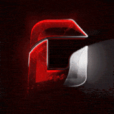 a red and black letter g on a dark red background
