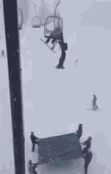 Snowboarder Falls Off Ski Lift GIF - Ski Lift Ski Lift Fall Ski Lift Fail GIFs