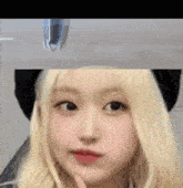 a close up of a woman 's face with the words selfcest in the upper right corner
