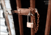 a picture of a padlock on a chain with the website 4gifs.com in the upper right corner