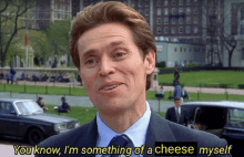 a man in a suit and tie says you know i m something of a cheese myself