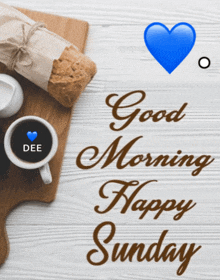 a sign that says good morning happy sunday with a blue heart