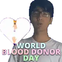 a man holding a heart with the words world blood donor day on it
