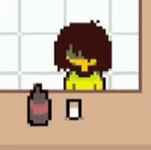 a pixel art of a person sitting at a table next to a bottle of lotion .