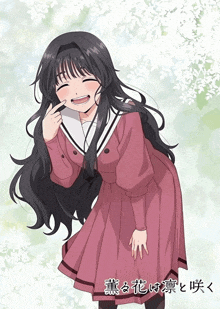 a girl in a pink dress is smiling in front of a tree with chinese writing on it