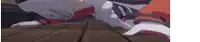a person is laying on a wooden table with a knife .