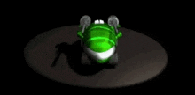 a green car with a white stripe on the side is spinning on a black surface .