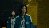 a girl with the number 067 on her jacket