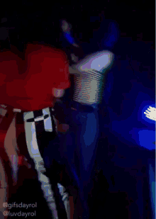 a gif of a man singing into a microphone with the words @gifsdayrol @luvdayrol