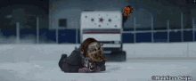 a person laying on the ice with maleficus origin written in the corner
