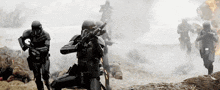 a group of storm trooper soldiers are walking through a battlefield .