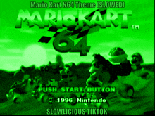 a video game called mario kart 64 is shown on a green screen