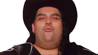a man with long hair and a nose ring is wearing a cowboy hat