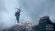 a poster for predator killer of killers features a man holding a sword