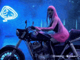 a woman with pink hair is sitting on a motorcycle with a neon ace of spades in the background