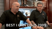two men are standing next to each other with the words best i can do is 2009