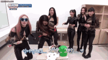 a group of girls are standing around a table with a unicorn on it and the words show champion written on the bottom