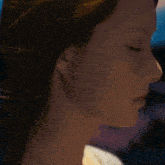 a woman in a sweater with a heart on it