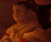 a pixelated image of a man wearing a t-shirt that says ' a ' on it