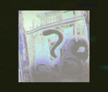 a picture of a question mark on a purple and green background