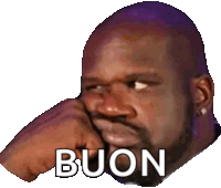 a man with a beard is holding his fist to his face and the word buon is on the bottom of his face .