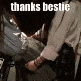 a woman is holding another woman 's waist and the words `` thanks bestie '' are visible .