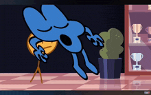 a blue cartoon character is yawning next to a potted plant and trophies