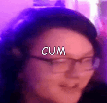 a close up of a person wearing glasses and headphones with the word cum on their forehead .