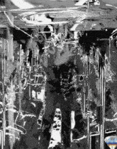 a black and white painting of a man standing in a room