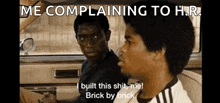 a couple of men are sitting in a car and one of them is complaining to the other .