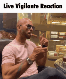 a bald man smoking a cigar with the words live vigilante reaction below him
