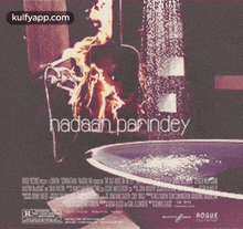 a movie poster for hadaan panindey shows a guitar on fire and a bathtub