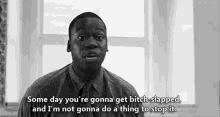 a black and white photo of a man in a shirt and tie saying some day you 're gonna get bitch-slapped