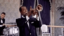 louis armstrong playing trumpet