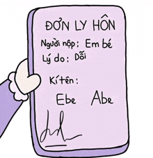 a hand is holding a piece of paper with a signature on it