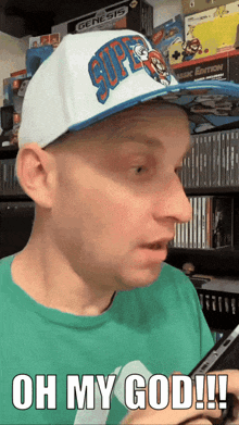 a man wearing a super mario hat and a green shirt says " oh my god "