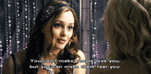 a woman talking to another woman with the words " you can 't make people love you but you can make them fear you " on the bottom