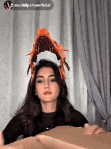 a woman wearing a headband with a shark on it and the caption zeudidipalmaofficial