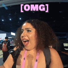 a woman with a surprised look on her face has the word omg written above her