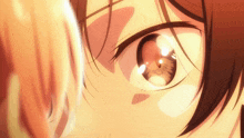 a close up of a person 's eye with a reflection of another person 's eye