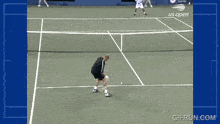 a tennis game is being played in front of a us open banner