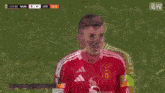 a blurred image of a soccer game between mun and lyo with a score of 2 to 4